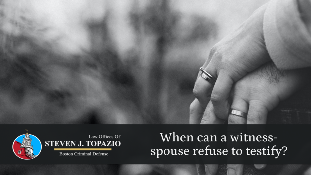 a couple holding hands with Attorney Steven J Topazio's logo and the blog title: When can a witness-spouse refuse to testify?