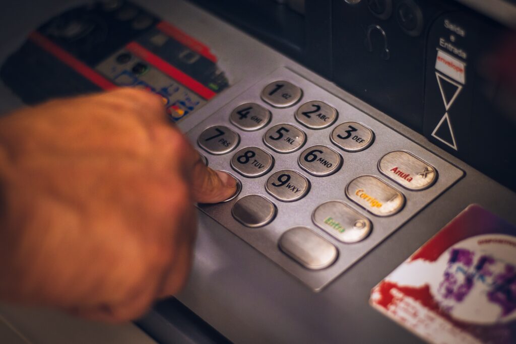 photo of atm buttons for credit card fraud attorney steven topazio 