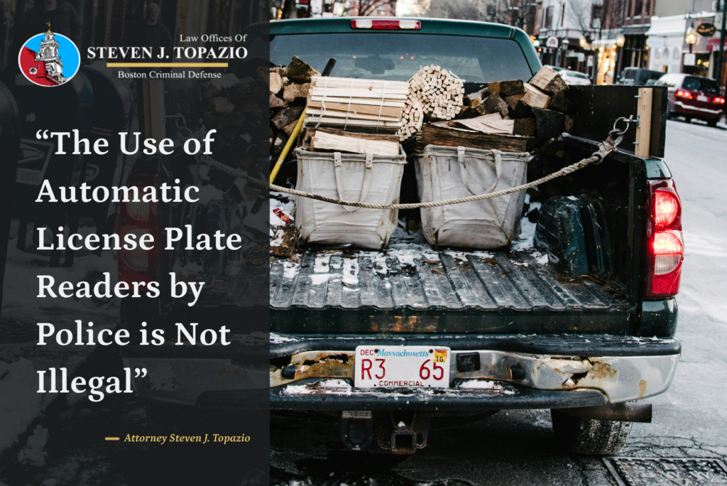 Photo of a truck with a massachusetts license plate with the text 'the use of automatic license plate readers by police is not illegal'